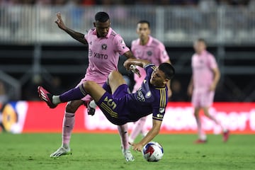 Inter Miami CF midfielder Dixon Arroyo (3) and Orlando City SC midfielder César Araujo (5) battle for the ball during the second half at DRV PNK Stadium.